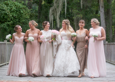 fun photo of bridesmaids walking
