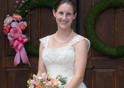 Bride by a church door