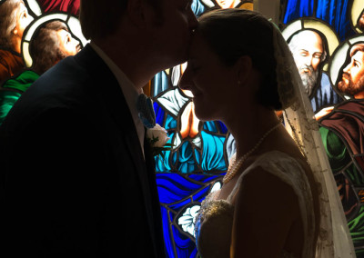 Bride and groom in stained glass window