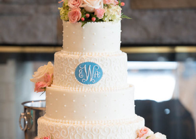 Wedding cake with flowers and monogram