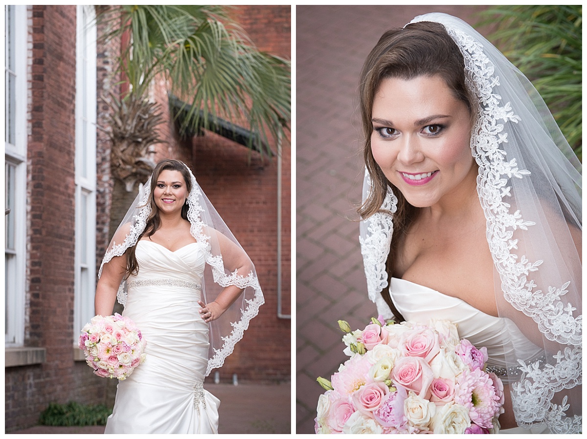 Bridal close up portrait with lacy veil and pink bouquet