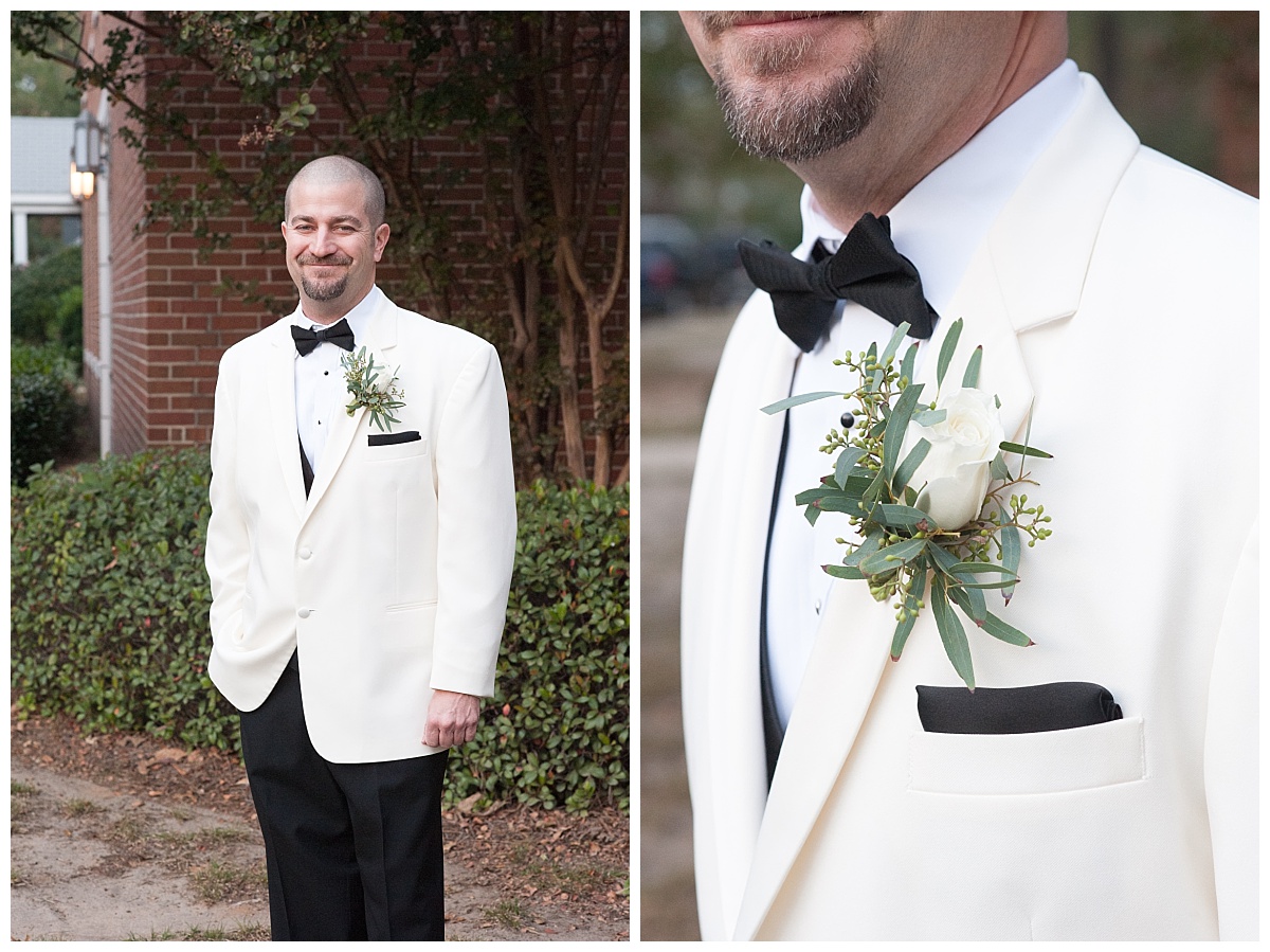 Groom with white jacket and boutineer