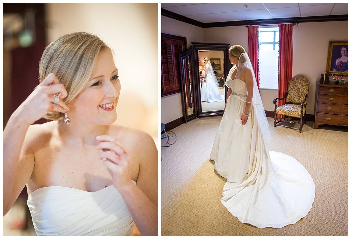 Bride putting earrings on