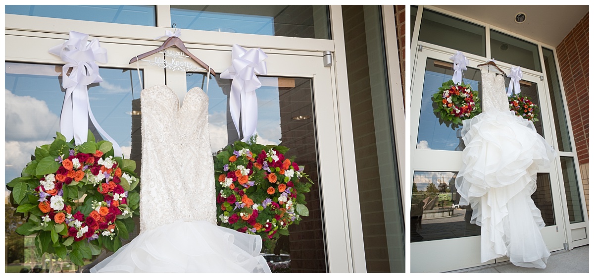Wedding dress hanging on door