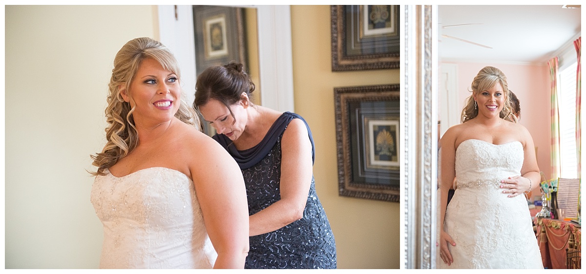 Bride getting into dress